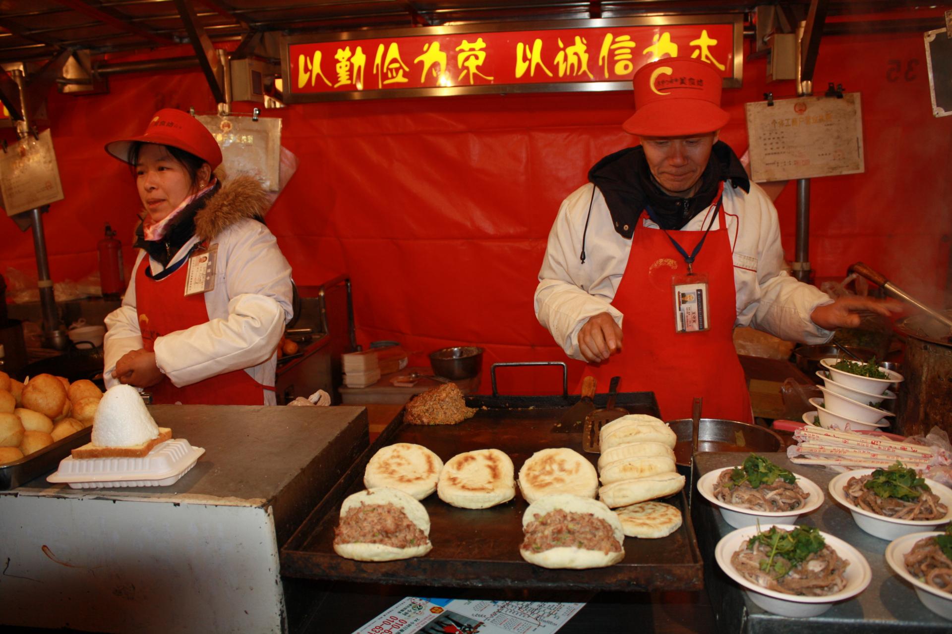 Szene n der Garküche Peking